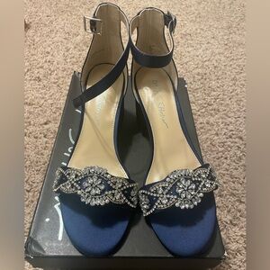 Brand new. Never worn Betsey Johnson Heels. Size 7. Navy